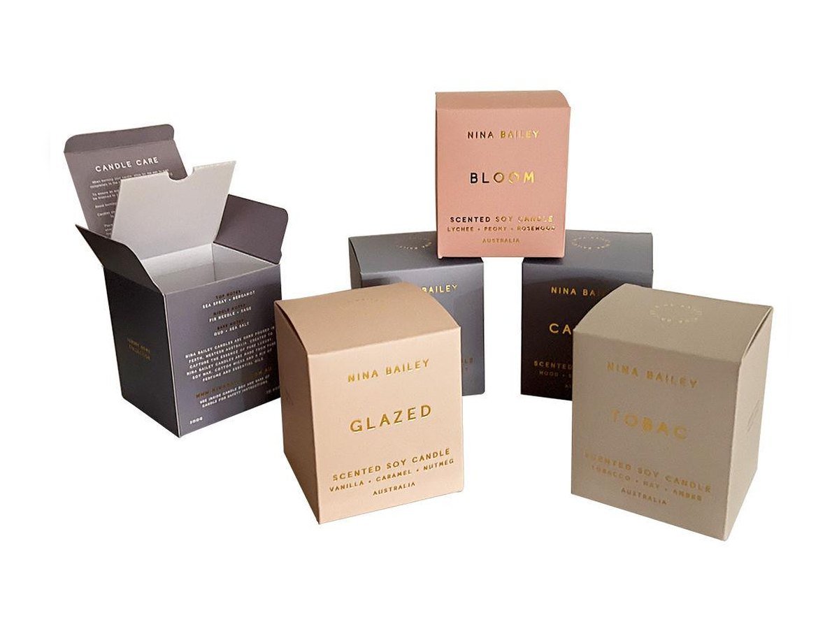 Custom foil-stamped folding carton candle boxes manufactured by Elite Pack Labs